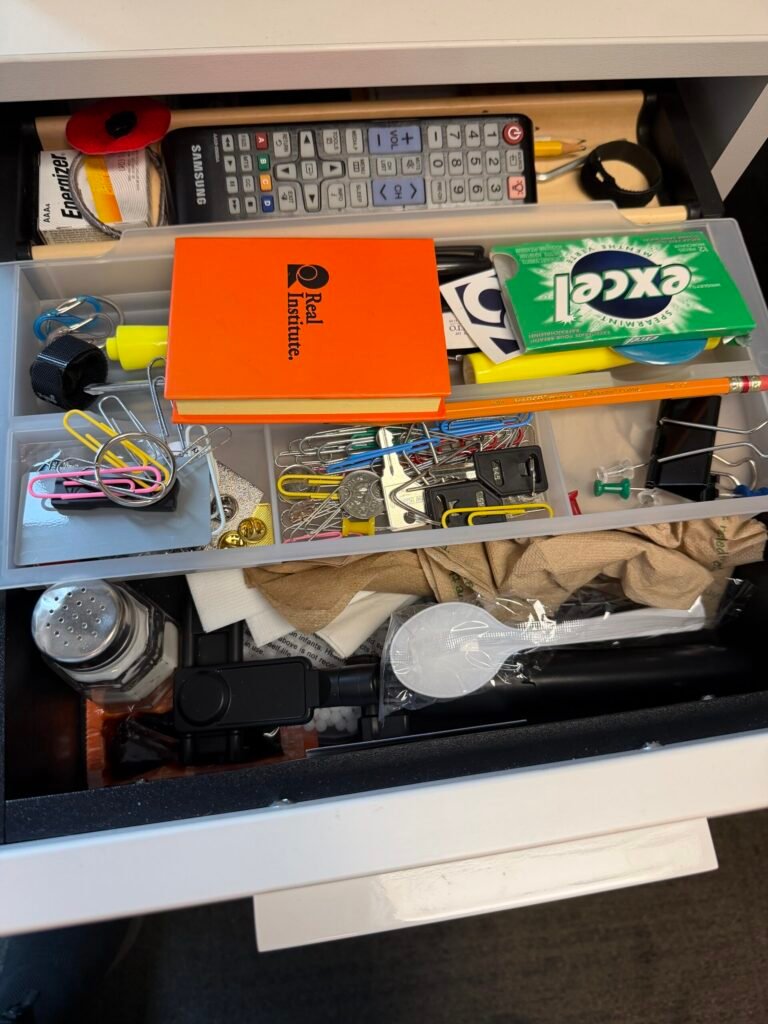 open drawer full of junk