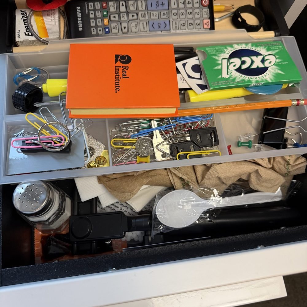 open drawer full of junk